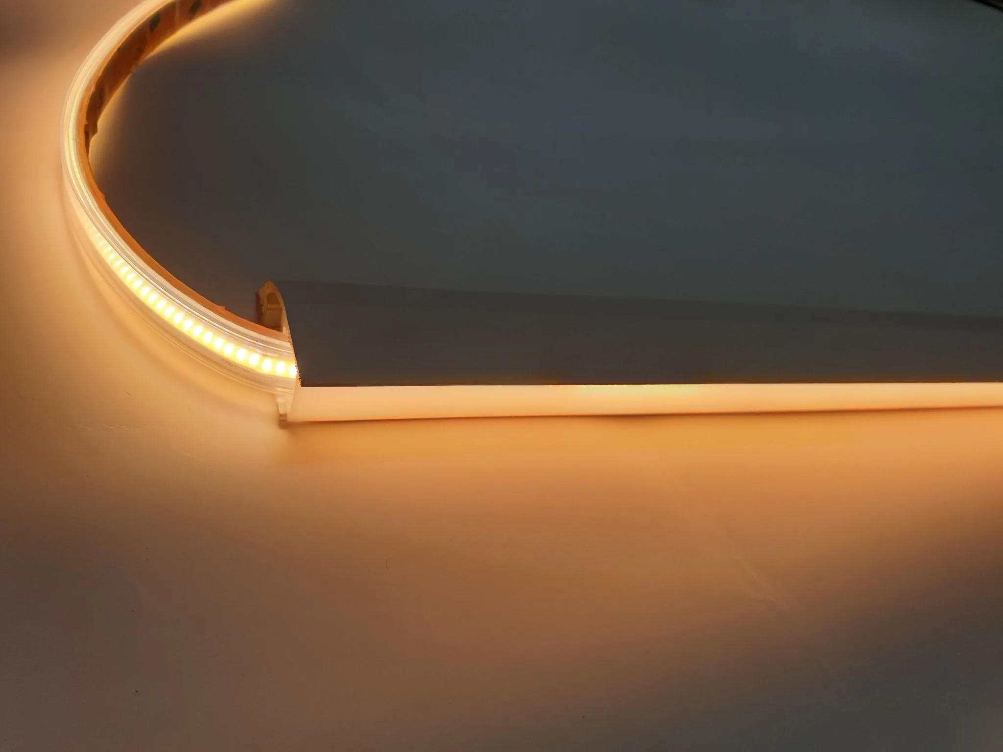 HAGA coveless cove profile with integrated COB LED strip light, providing smooth and seamless home illumination.
